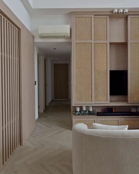 Japandi living room with rattan cabinets, herringbone floor and Christmas decor