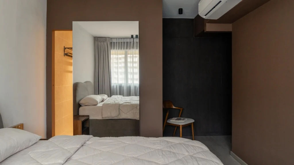 Small bedroom layout with clear floor space walkway and compact zones for limited square footage
